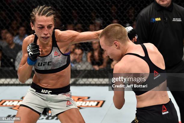 Joanna Jedrzejczyk of Poland punches Rose Namajunas in their women's strawweight title bout during the UFC 223 event inside Barclays Center on April...