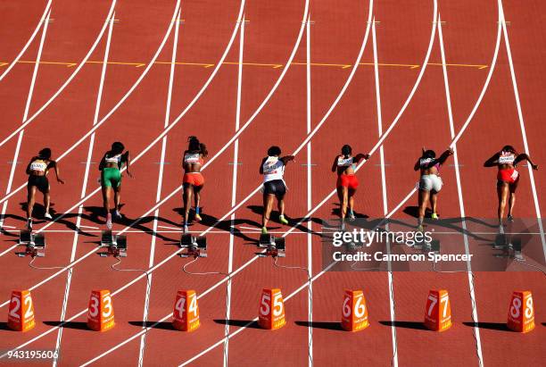 Athletes compete at the start of the Women's 100 metres heats on day four of the Gold Coast 2018 Commonwealth Games at Carrara Stadium on April 8,...