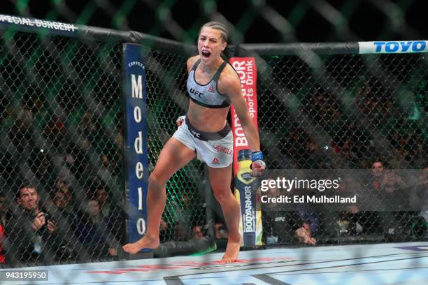 Joanna Jedrzejczyk enters the octagon before her UFC women's strawweight championship bout at UFC 223 at Barclays Center on April 7, 2018 in New York...