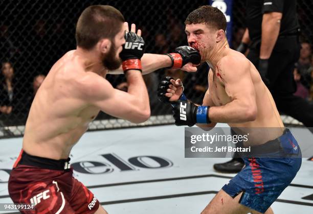 Khabib Nurmagomedov of Russia punches Al Iaquinta in their lightweight title bout during the UFC 223 event inside Barclays Center on April 7, 2018 in...