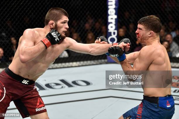 Khabib Nurmagomedov of Russia punches Al Iaquinta in their lightweight title bout during the UFC 223 event inside Barclays Center on April 7, 2018 in...