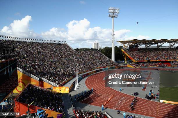 General views as athletes compete at the start of the Men's 100 metres heats on day four of the Gold Coast 2018 Commonwealth Games at Carrara Stadium...