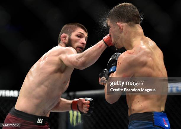 Khabib Nurmagomedov of Russia punches Al Iaquinta in their lightweight title bout during the UFC 223 event inside Barclays Center on April 7, 2018 in...