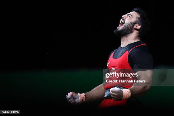 Vikas Thakur of India celebrates a lift in the Men's 94kg final during Weightlifting on day four of the Gold Coast 2018 Commonwealth Games at Carrara...