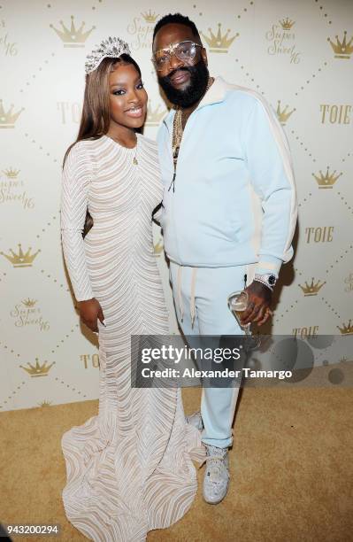 Toie Roberts and Rick Ross attend Toie's Royal Court: Super Sweet 16 at Versace Mansion on April 7, 2018 in Miami, Florida.