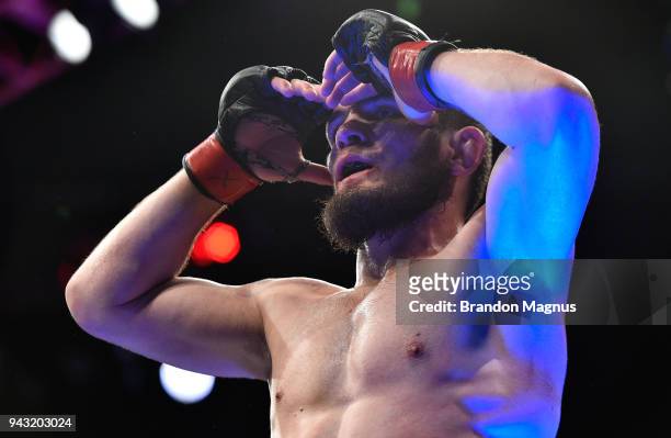 Khabib Nurmagomedov of Russia reacts after his dominating performance over Al Iaquinta in their lightweight title bout during the UFC 223 event...