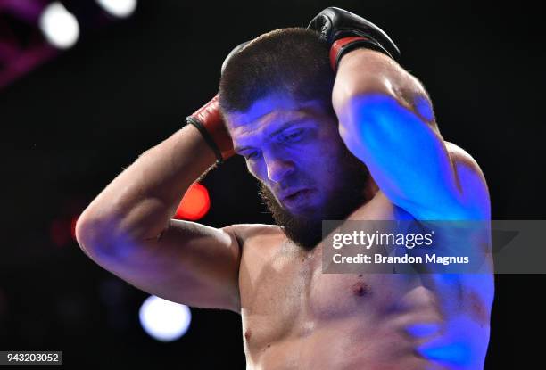 Khabib Nurmagomedov of Russia reacts after his dominating performance over Al Iaquinta in their lightweight title bout during the UFC 223 event...