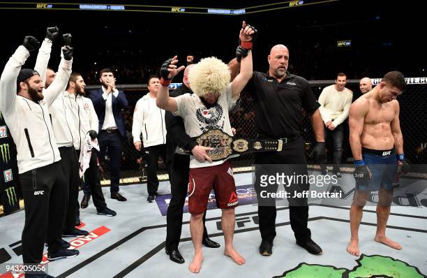 Khabib Nurmagomedov of Russia celebrates after his unanimous-decision victory over Al Iaquinta in their lightweight title bout during the UFC 223...