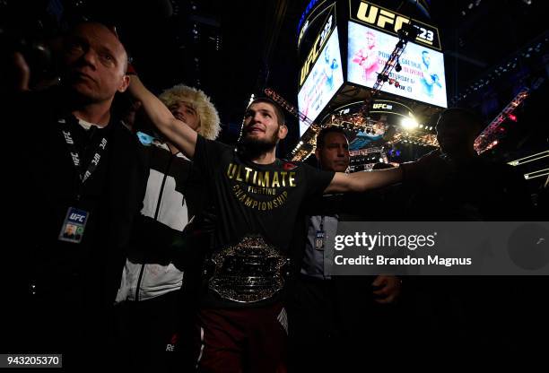 Khabib Nurmagomedov of Russia celebrates after his unanimous-decision victory over Al Iaquinta in their lightweight title bout during the UFC 223...