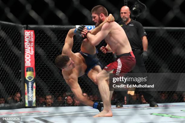 Khabib Nurmagomedov attempts a takedown on Al Iaquinta during their UFC lightweight championship bout at UFC 223 at Barclays Center on April 7, 2018...