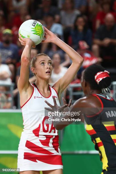 Helen Housby of England shoots during Netball match between England and Uganda on day four of the Gold Coast 2018 Commonwealth Games at Gold Coast...
