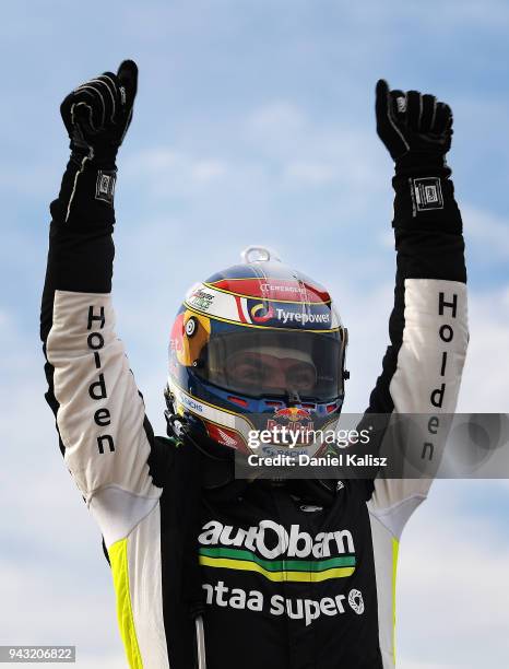 Craig Lowndes driver of the Autobarn Lowndes Racing Holden Commodore ZB celebrates after winning race 2 for the Supercars Tasmania SuperSprint on...