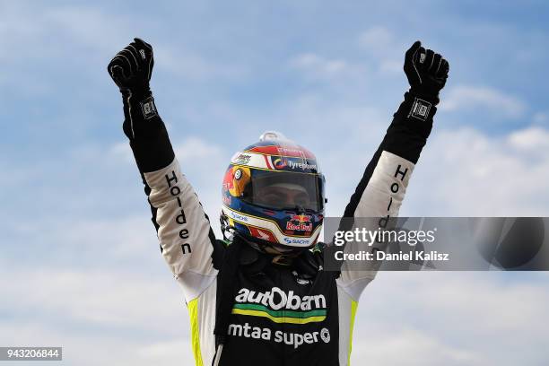 Craig Lowndes driver of the Autobarn Lowndes Racing Holden Commodore ZB celebrates after winning race 2 for the Supercars Tasmania SuperSprint on...