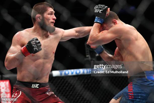 Khabib Nurmagomedov throws a left hand to the head of Al Iaquinta during their UFC lightweight championship bout at UFC 223 at Barclays Center on...