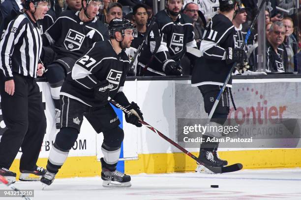 Alec Martinez of the Los Angeles Kings looks to pass the puck during a game against the Dallas Stars at STAPLES Center on April 7, 2018 in Los...