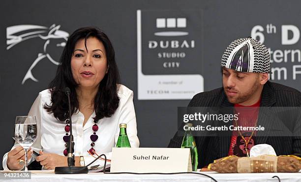 Interpreter Reem Owais and Suhel Nafar attend the "Checkpoint Rock" press conference during day four of the 6th Annual Dubai International Film...