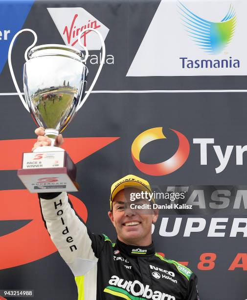 Race winner Craig Lowndes driver of the Autobarn Lowndes Racing Holden Commodore ZB celebrates after race 2 for the Supercars Tasmania SuperSprint on...