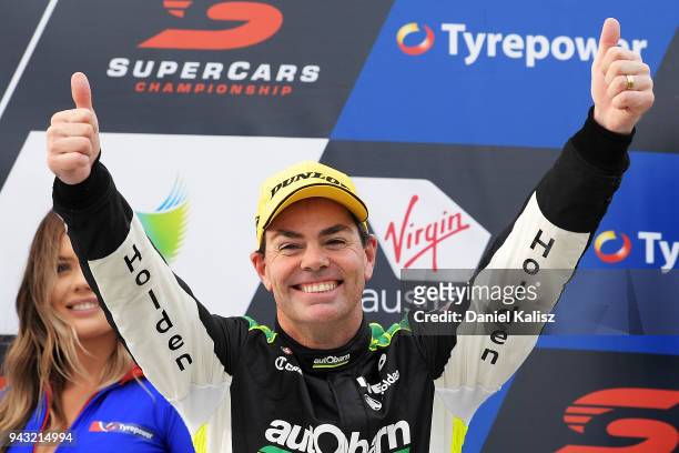 Race winner Craig Lowndes driver of the Autobarn Lowndes Racing Holden Commodore ZB celebrates after race 2 for the Supercars Tasmania SuperSprint on...
