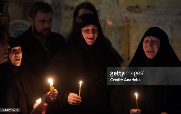 Nuns hold candles and sing psalms in celebration of the Orthodox Easter at Marko's Monastery near Skopje, Macedonia on April 8, 2018. The Macedonian...