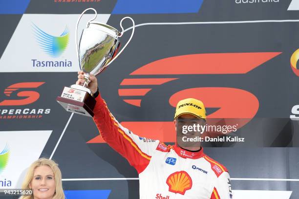 2nd palce Scott McLaughlin driver of the Shell V-Power Racing Team Ford Falcon FGX celebrates on the podium after race 2 for the Supercars Tasmania...