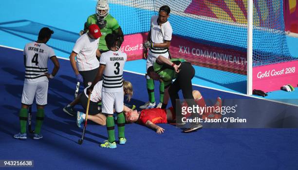England's Liam Sanford suffers an injury against Pakistan during Hockey on day four of the Gold Coast 2018 Commonwealth Games at Gold Coast Hockey...