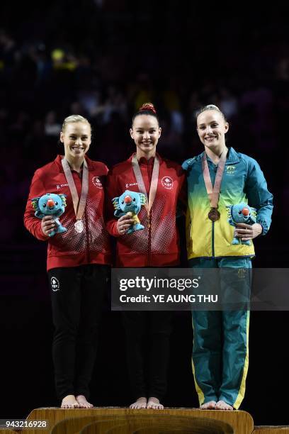 Gold medallist Canada's Shallon Olsen poses with silver medallist Canada's Elsabeth Black and bronze medallist Australia's Emily Whitehead after the...