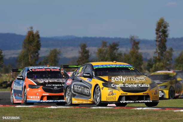 Tim Slade drives the Freightliner Racing Holden Commodore ZB leads Nick Percat drives the Brad Jones Racing Commodore ZB during race 2 for the...