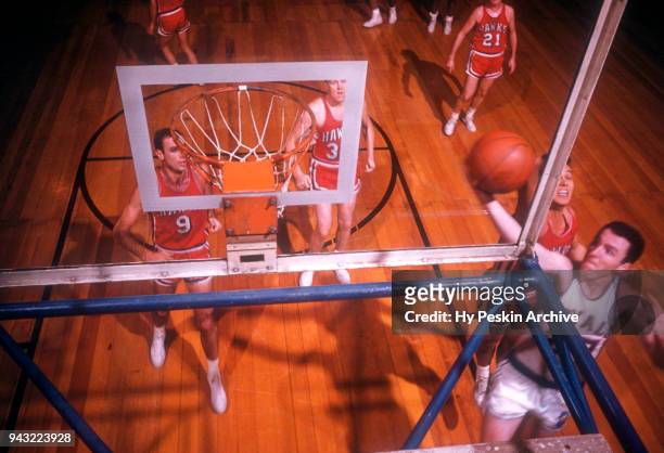 Jack Twyman of the Cincinnati Royals goes for the lay-up during an NBA game against the St. Louis Hawks on November 2, 1958 at the Cincinnati Gardens...