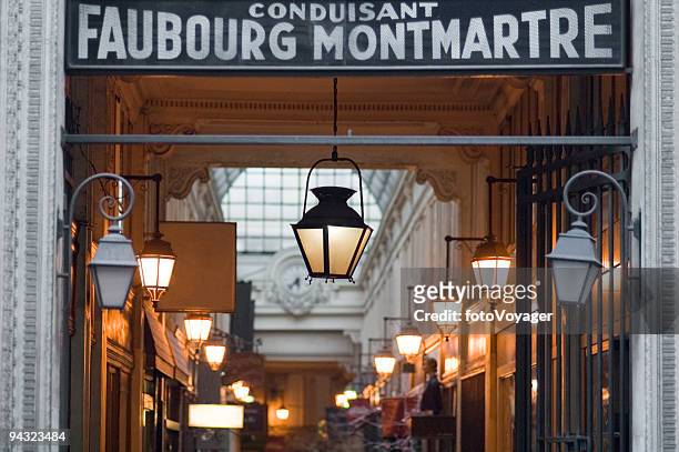 entrance to passage couverts, paris - montmartre stock pictures, royalty-free photos & images