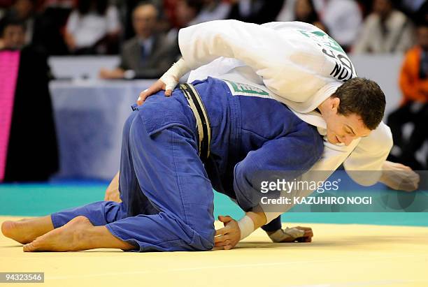 Britain's Euan Burton tries to hold South Korea's Kim Jae-Bum in the men's -81kg class final match at the Grand Slam Tokyo judo tournament at Tokyo...