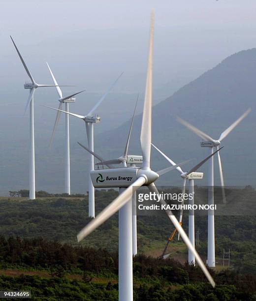 Japan-environment-climate-warming, by Patrice Novotny Aerial view of wind towers produced by Eurus Energy Japan Corp. In Higashi-Dori, tip of Japan's...