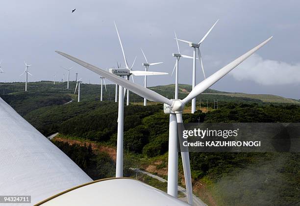 Japan-environment-climate-warming, by Patrice Novotny Aerial view of wind towers produced by Eurus Energy Japan Corp. In Higashi-Dori, tip of Japan's...