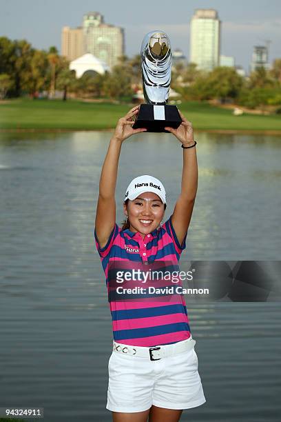 In Kyung Kim of South Korea holds the trophy after the final round of the Dubai Ladies Masters, on the Majilis Course at the Emirates Golf Club on...