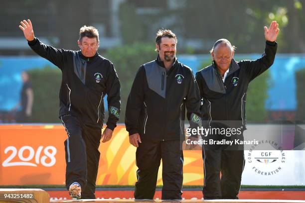 Phillip Jones, Hadyn Evans and Ryan Dixon of Norfolk Island celebrate after winning the bronze medal in the Men's Lawn Bowls Triple's on day four of...