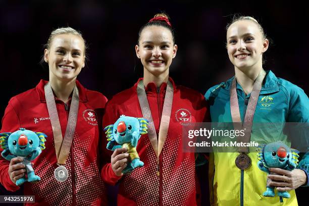 Silver medalist Emily Whitehead of Australia, gold medalist Shallon Olsen of Canada and bronze medalist Elsabeth Black of Canada pose during the...