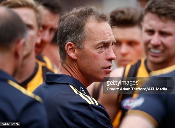 Alastair Clarkson, Senior Coach of the Hawks addresses his players during the 2018 AFL round 03 match between the Richmond Tigers and the Hawthorn...