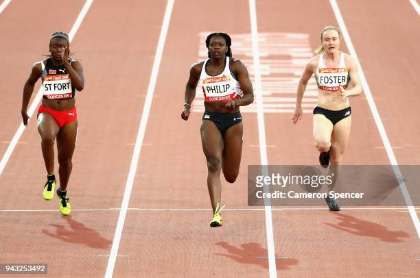 Khalifa St. Fort of Trinidad and Tobago, Asha Philip of England and Amy Foster of Northern Ireland compete in the Women's 100 metres semi finals on...