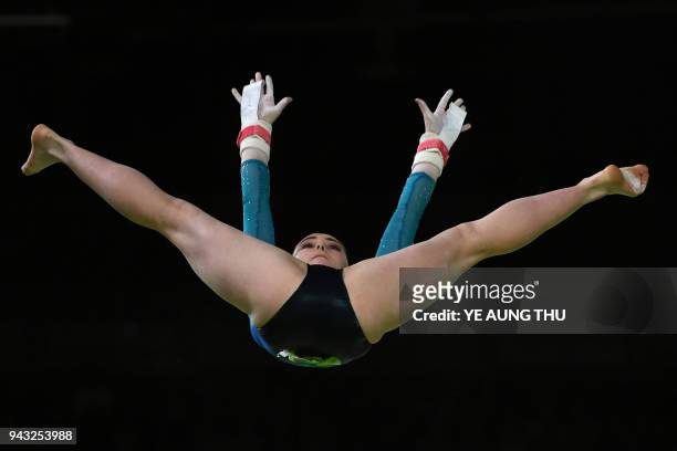 Wales' Latalia Bevan competes in the women's uneven bars final artistic gymnastics event during the 2018 Gold Coast Commonwealth Games at the Coomera...