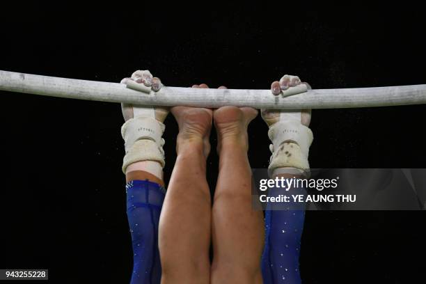 Canada's Brittany Rogers competes in the women's uneven bars final artistic gymnastics event during the 2018 Gold Coast Commonwealth Games at the...