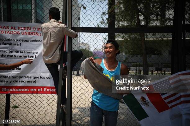 Group of Central American migrants, part of the the annual Stations of the Cross caravan march for migrants' rights, during a protest in Mexico City,...