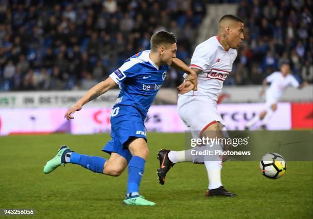 Leandro Trossard forward of KRC Genk and Carlos Vinicius Carlinhos midfielder of Standard Liege during the Jupiler Pro League Play - Off 1 match...