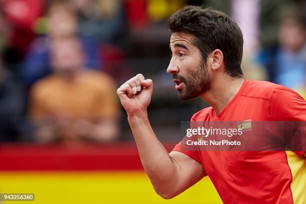 Marc Lopez of Spain celebrates a point in his doubles match with Feliciano Lopez of Spain against Tim Putz and Jan-Lennard Struff of Germany during...