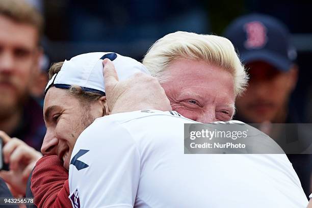 Boris Becker of Germany celebrates the victory with Jan-Lennard Struff of Germany during the doubles match between Feliciano Lopez and Marc Lopez of...