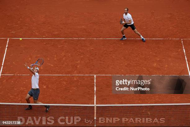 Jan-Lennard Struff and Tim Putz of Germany in action in their doubles match against Feliciano Lopez and Marc Lopez of Spain during day two of the...