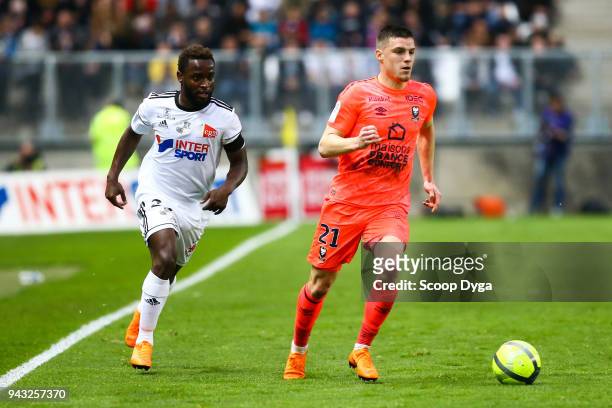 Frederic Guilbert of SM Caen and Steven Mendoza of Amiens SC during the Ligue 1 match between Amiens SC and SM Caen at Stade de la Licorne on April...