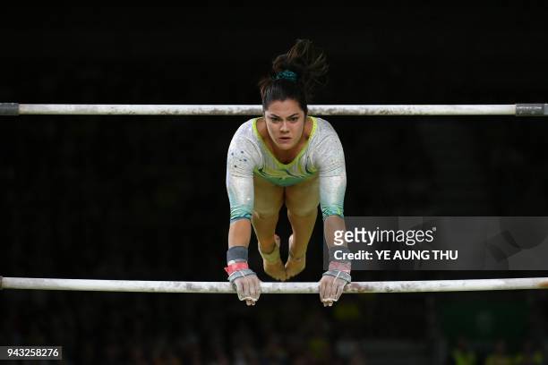 Australia's Georgia Godwin competes in the women's uneven bars final artistic gymnastics event during the 2018 Gold Coast Commonwealth Games at the...