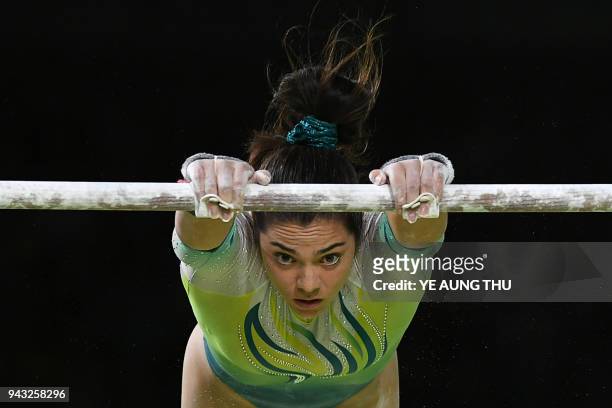 Australia's Georgia Godwin competes in the women's uneven bars final artistic gymnastics event during the 2018 Gold Coast Commonwealth Games at the...