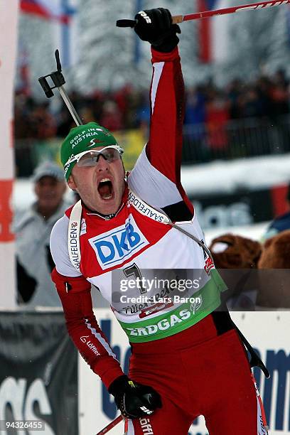 Simon Eder of Austria celebrates during the Men's 12,5 km Pursuit in the IBU Biathlon World Cup on December 12, 2009 in Hochfilzen, Austria.