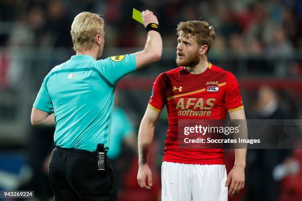 Referee Kevin Blom, Fredrik Midtsjo of AZ Alkmaar during the Dutch Eredivisie match between AZ Alkmaar v PSV at the AFAS Stadium on April 7, 2018 in...