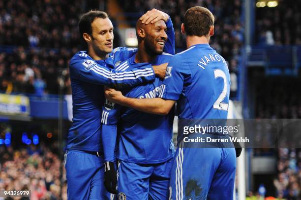 Nicolas Anelka of Chelsea celebrates with team mates Ricardo Carvalho and Branislav Ivanovic after scoring his sides second goal during the Barclays...